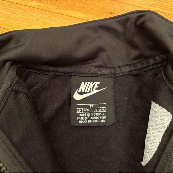 Nike black track zip up jacket with orange/yellow stripe down arms - Picture 5 of 5